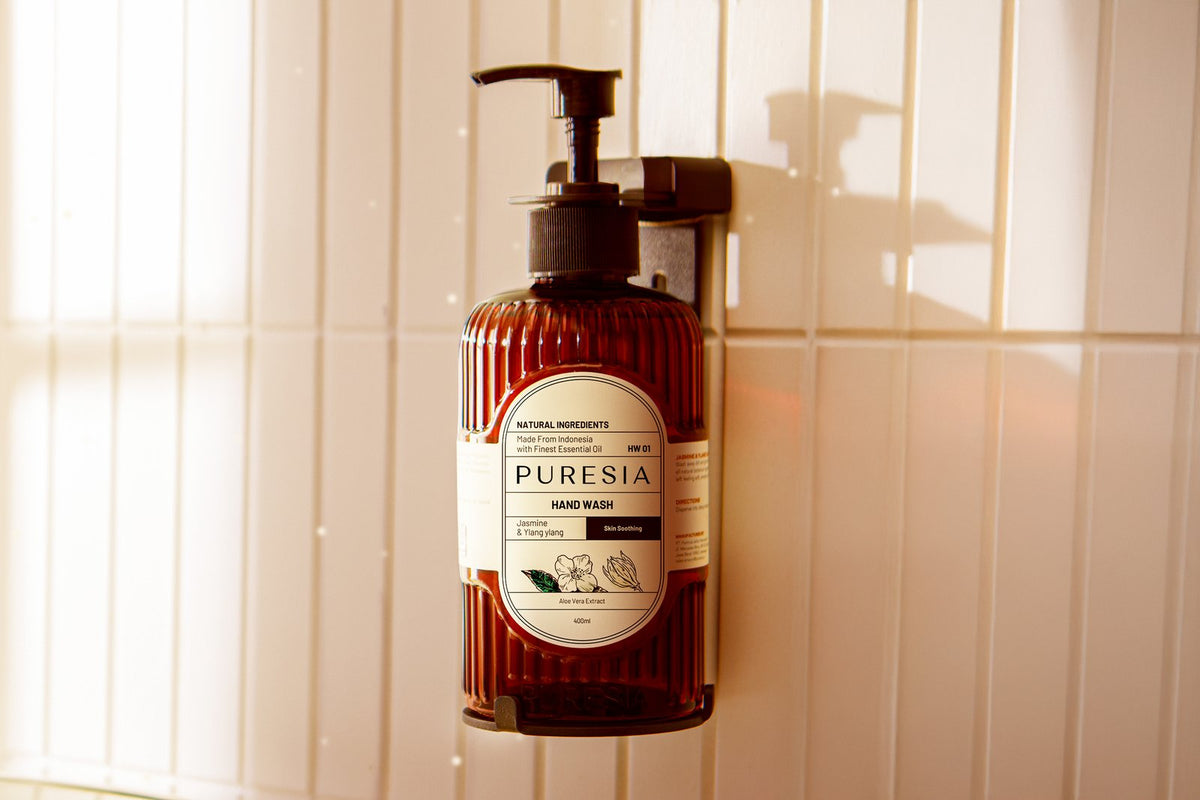 PURESIA hand wash in a wall-mounted hotel bathroom dispenser