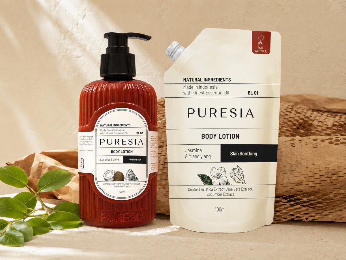 A PURESIA body lotion refill pouch beside a bottle with recycled kraft packaging