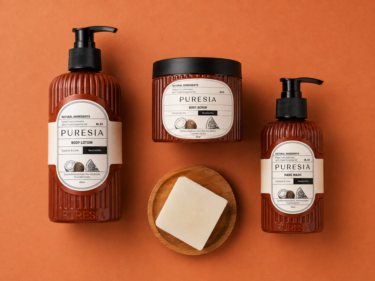 The PURESIA range flat-lay on a terracotta ground